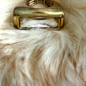 Gold tone ring with faux diamond